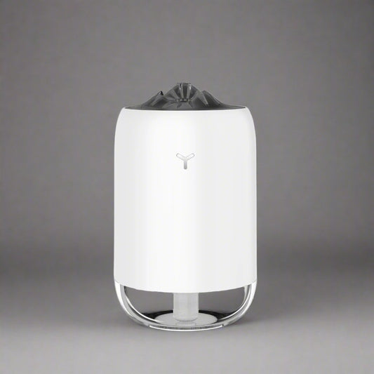 White Magic Flame Aroma Diffuser Humidifier with a sleek design and LED lighting feature, suitable for desktop and car use. Ideal for home, office, and travel settings.